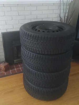 235/65R16 Bridgestone Blizzak Tires on steel rims