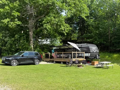 RARE WATERFRONT CAMPSITE & TRAILER PACKAGE ON DOG LAKE