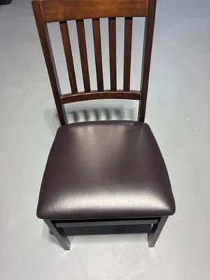 Dining table with 4 foldable chairs with leather seating