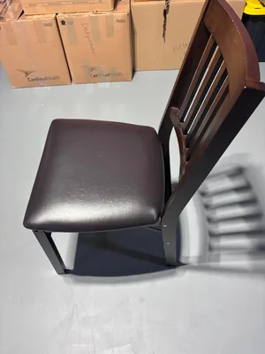 Dining table with 4 foldable chairs with leather seating