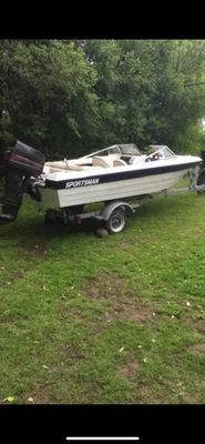 boat, motor, and trailer
