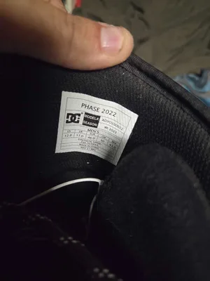 DC snowboarding boots and used size 10 sugi bootsand snowboard