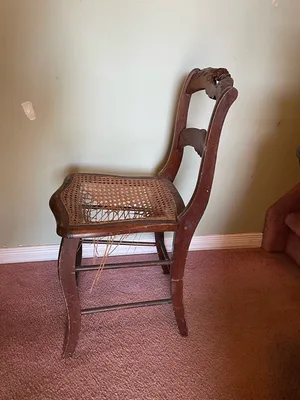 Beautiful antique solid wood chairs - carved backs / cane seats