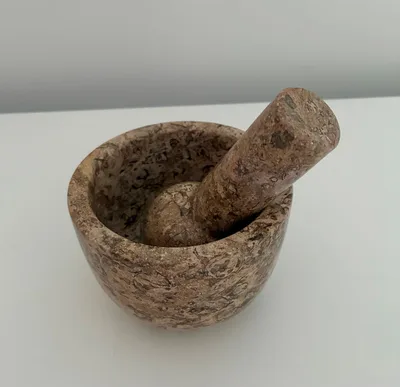 FOSSIL STONE MOTAR AND PESTEL