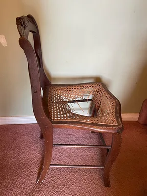 Beautiful antique solid wood chairs - carved backs / cane seats