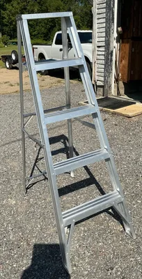 Ladders:  6ft. & 5ft. Aluminum Ladders  with paint tray