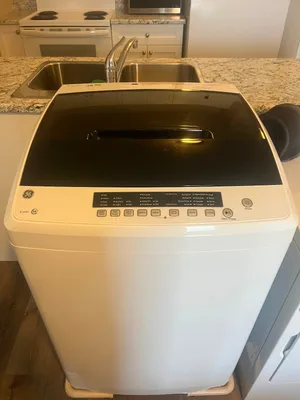 Selling ge portable washer and dryer set