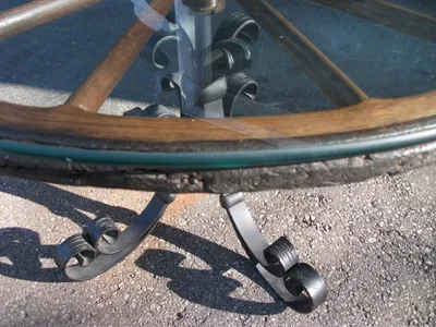 Antique Rotating Glass Top Wagon Wheel Coffee Table