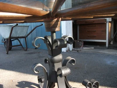 Antique Rotating Glass Top Wagon Wheel Coffee Table