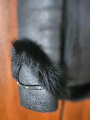 Black shearling jacket with fur trim