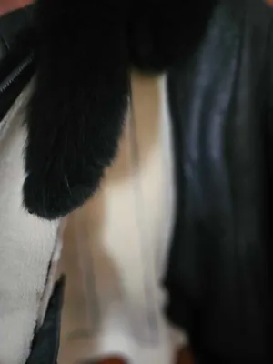Black shearling jacket with fur trim